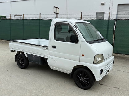 In CA - White Suzuki Carry - 1999
